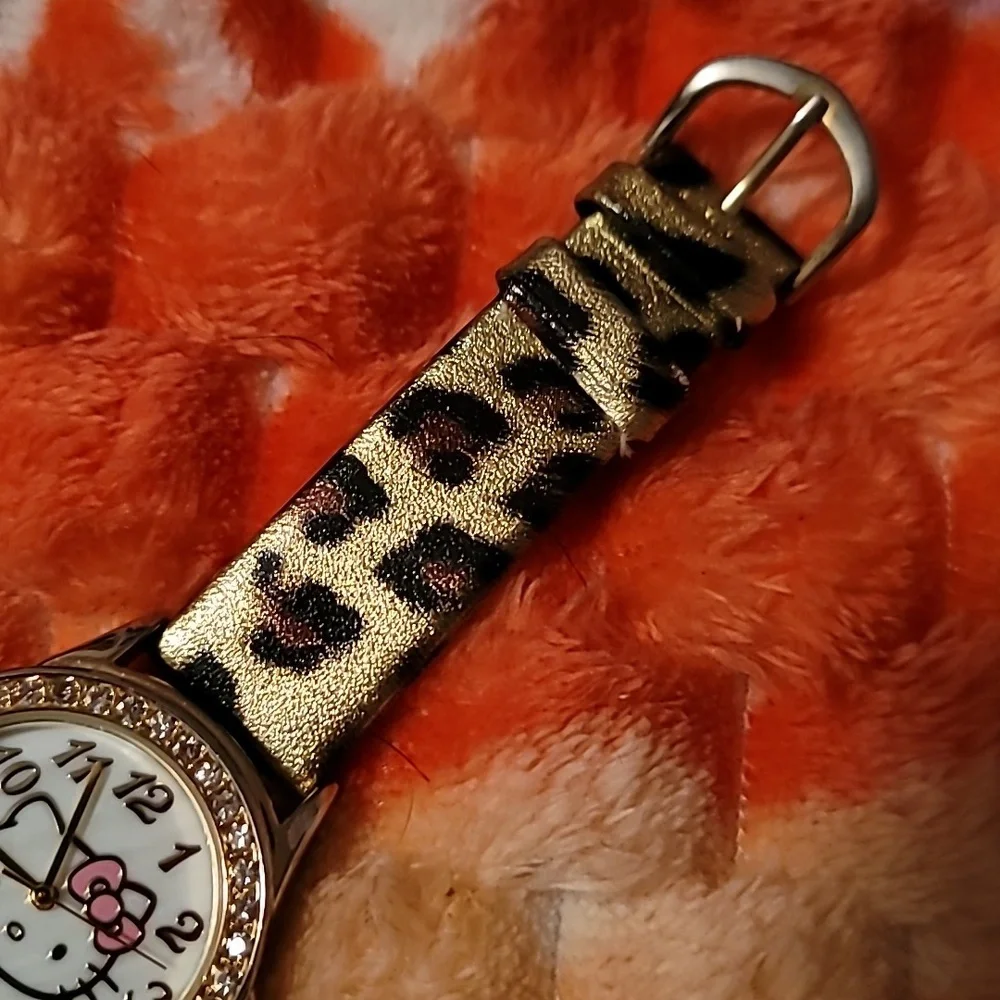 Sanrio Hello Kitty Gold Crystal Studded Bezel Leopard Print Band Textured Face‎